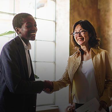 Mobile version of partnership opportunities banner showing two professionals shaking hands, optimized for smaller screens.